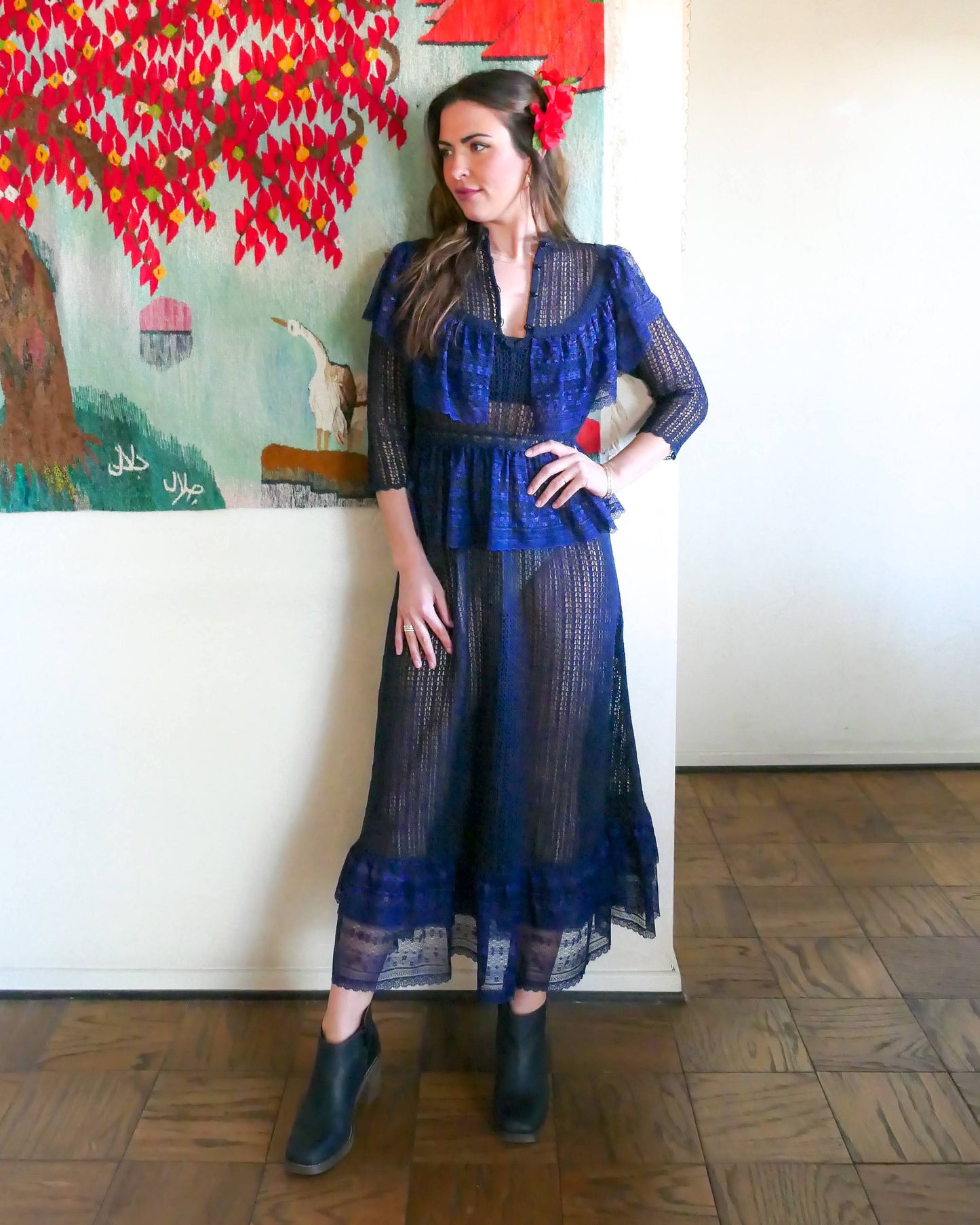 Worn with buttons in the front. A sultry indigo blue Victorian style crochet maxi dress with lace trim and elastic waist. Can be worn with the buttons going down the front or back. Wear with a slip and high black boots for a dramatic evening look.  Size: Fits small to medium   Measurements:  Bust 31"-36” Waist 26”- 34" Length 52” Shoulder width 15” Sleeve 18” Hip 46"