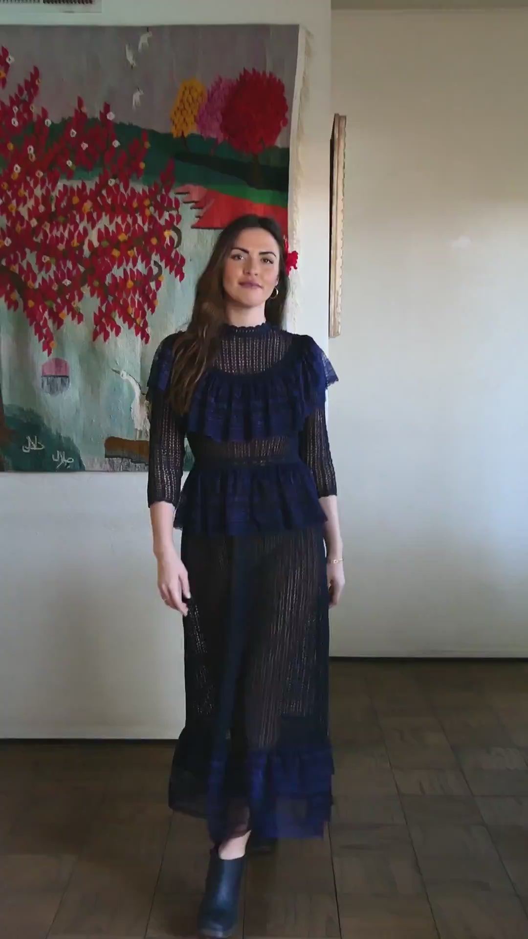 Video of model in dress. A sultry indigo blue Victorian style crochet maxi dress with lace trim and elastic waist. Can be worn with the buttons going down the front or back. Wear with a slip and high black boots for a dramatic evening look.  Size: Fits small to medium   Measurements:  Bust 31"-36” Waist 26”- 34" Length 52” Shoulder width 15” Sleeve 18” Hip 46"