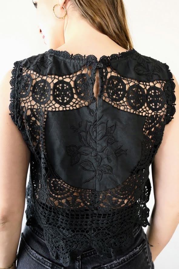 Back view of black crochet and embroidered patchwork tank top with rose embroidered motif.  By Lim's Vintage.