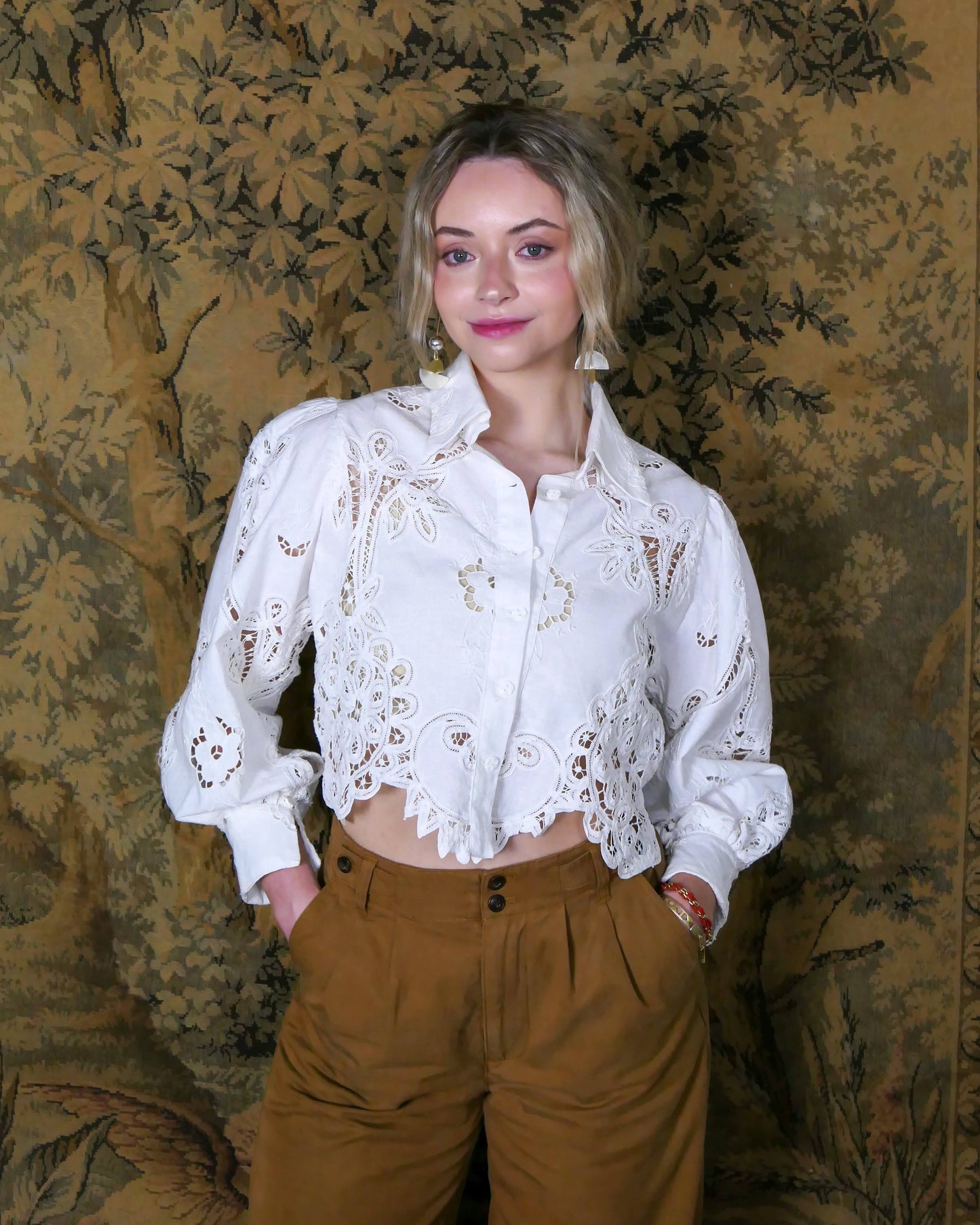 Chic, vintage, and one-of-a-kind, this semi crop top is made with our classic Lim's Vintage Battenberg lace. Comes with romantic puffed long sleeves and a scalloped hem. Wear it buttoned or unbuttoned with your favorite long skirt or wide leg jeans and boots, or dress it up with a pair of slacks and heels.