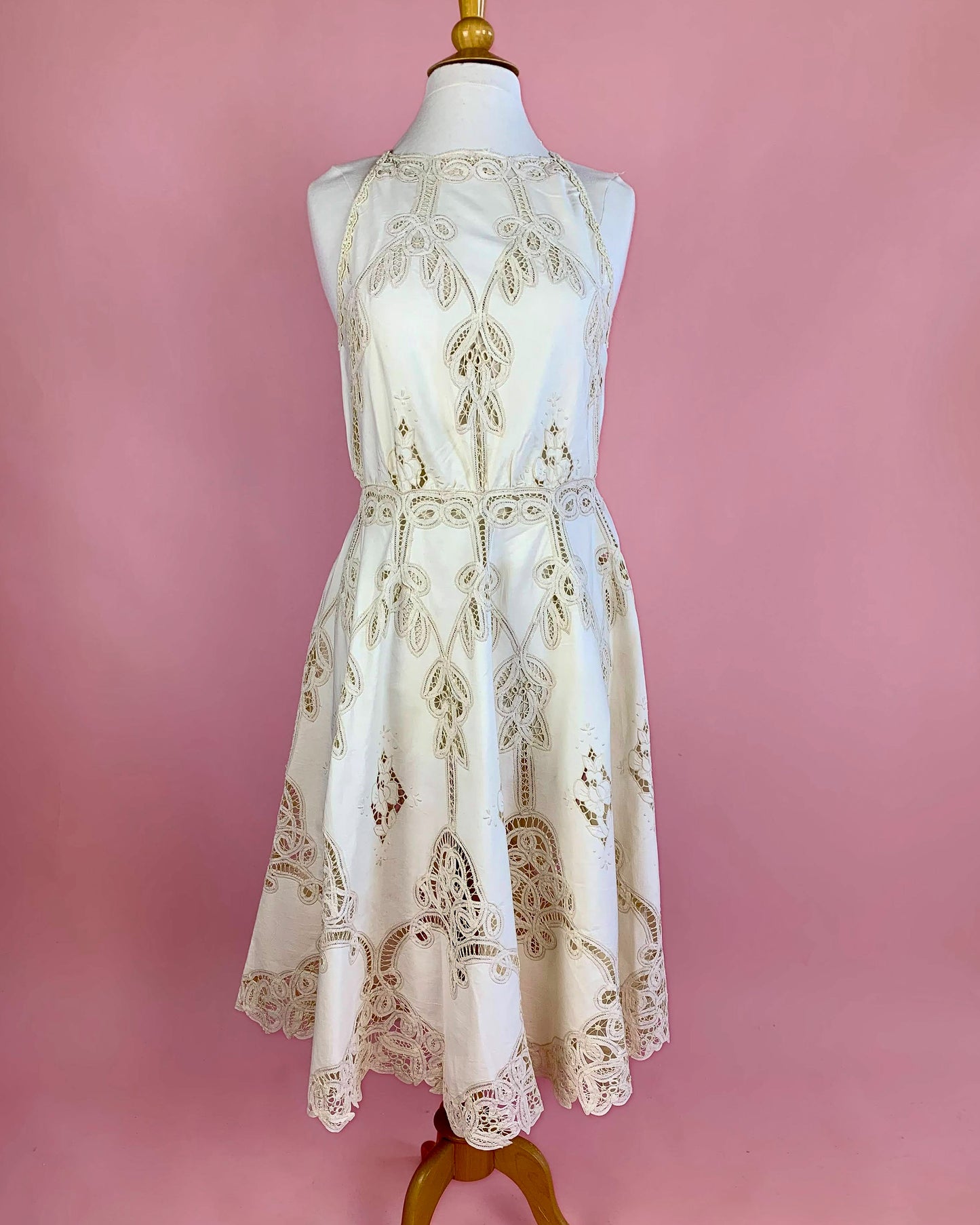 Lim's Vintage Battenberg lace midi length halter dress with a fitted waist and flared skirt.  Buttons up the back.    Measurements: *  Small:  Bust 36"   Waist 30"   Length: 46"     Medium:   Bust 38" Waist 32" Length 46" Large:  Bust 40" Waist 34" Length 46" Color: Natural  Material: 100% cotton